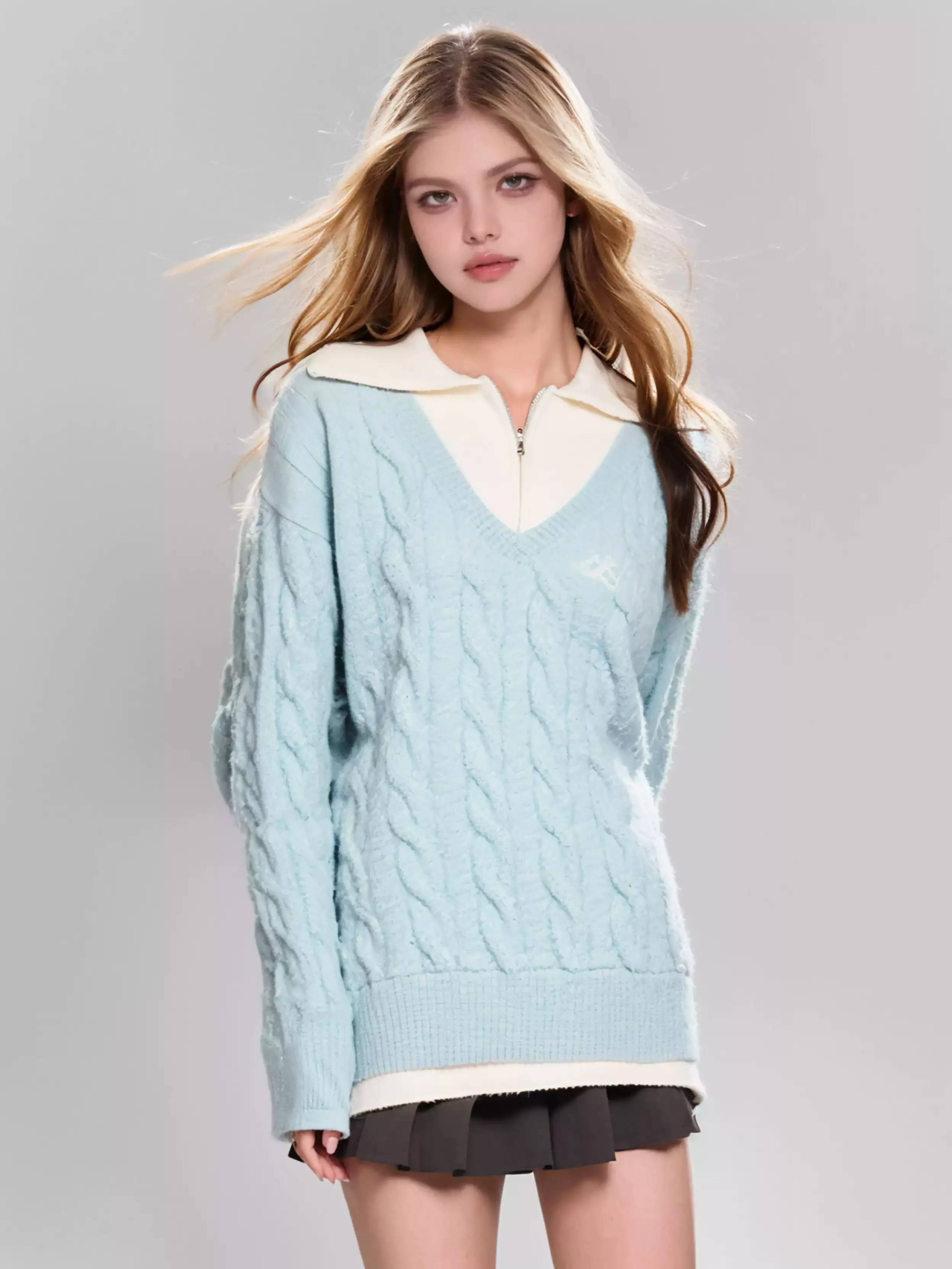 Fake two-piece cable knit sweater