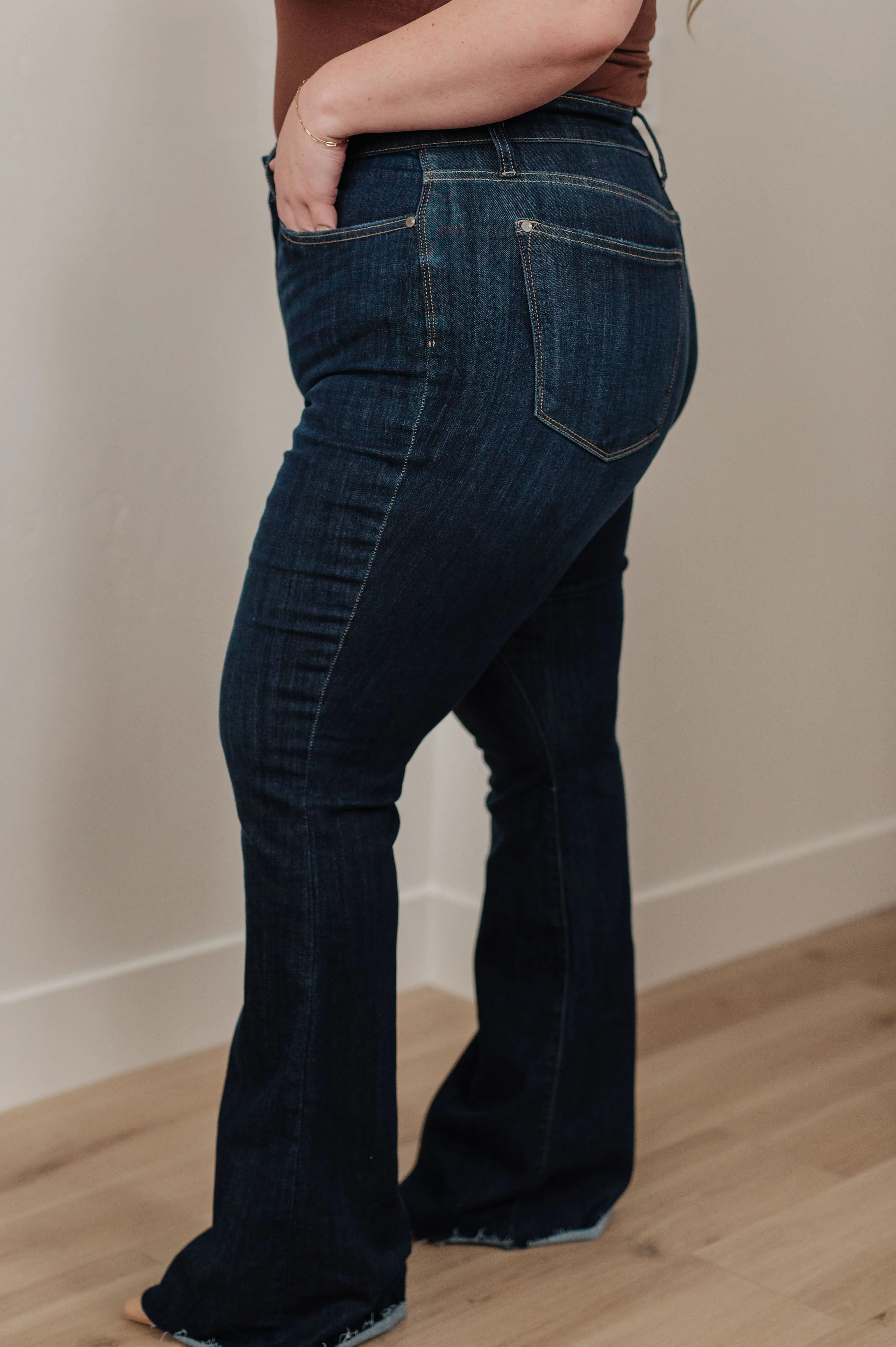 Judy Blue High-Rise Raw Hem Flare Jeans in Dark Wash