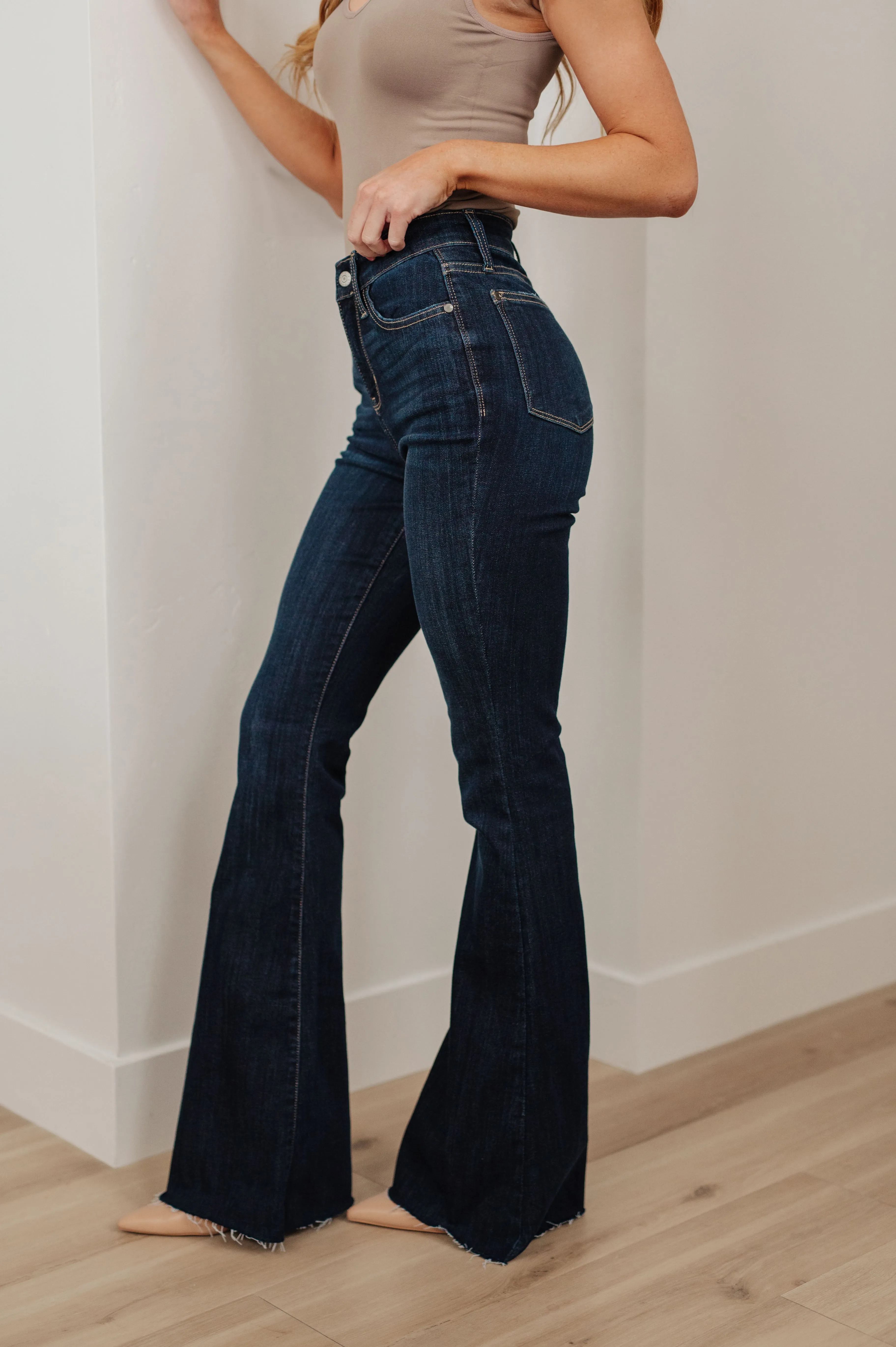 Judy Blue High-Rise Raw Hem Flare Jeans in Dark Wash