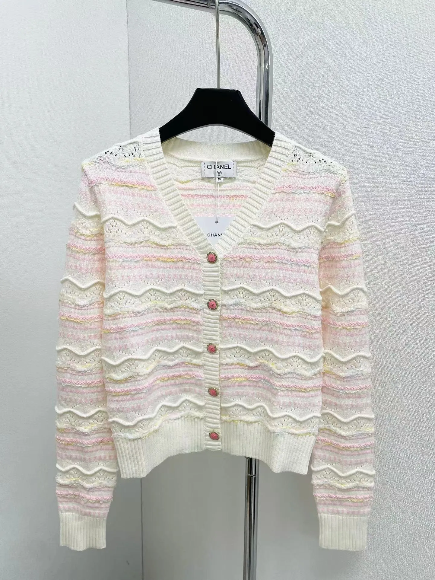 New style spliced hollow knitted cardigan