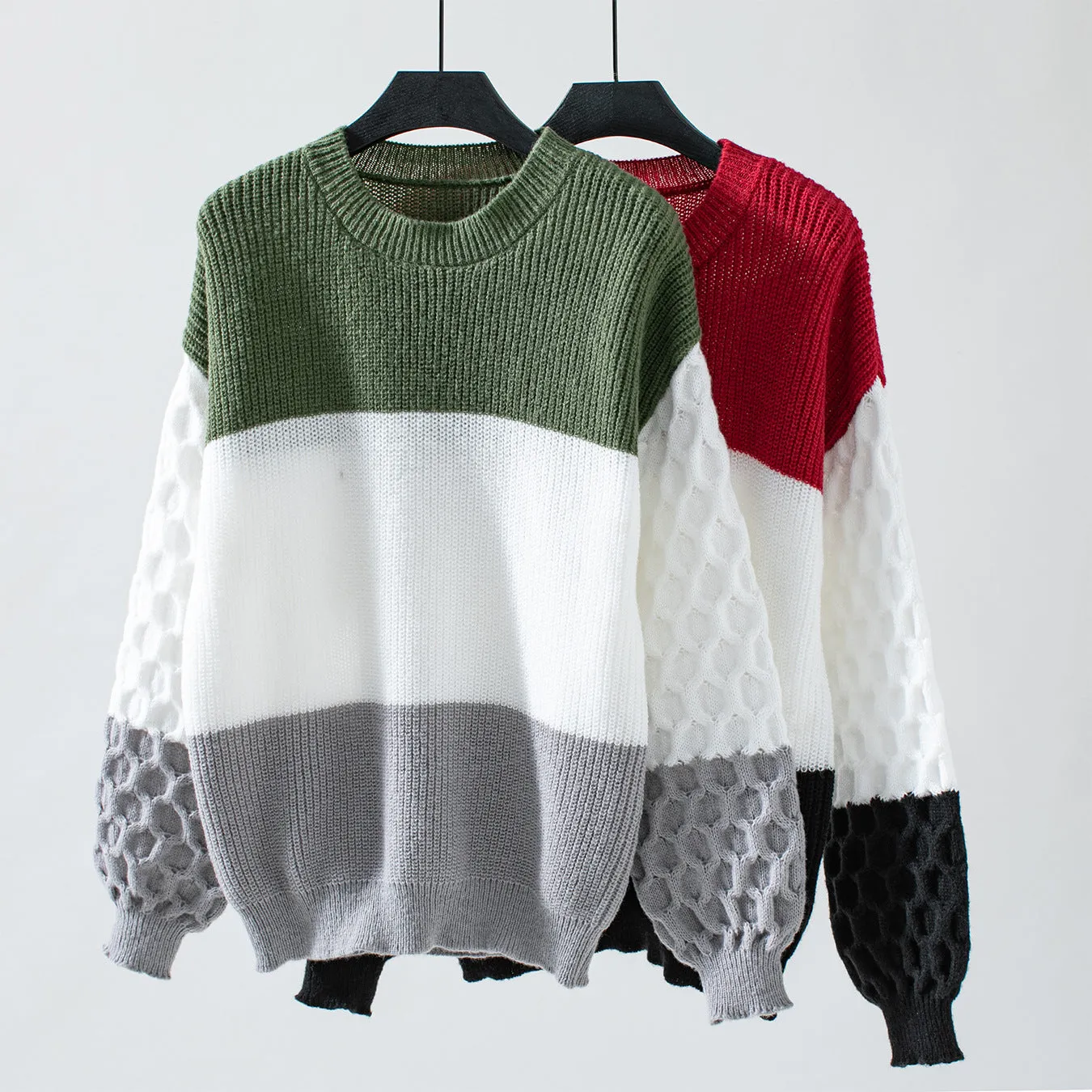 Trendy Women's Cable Knit Sweater with a Round Neck Design