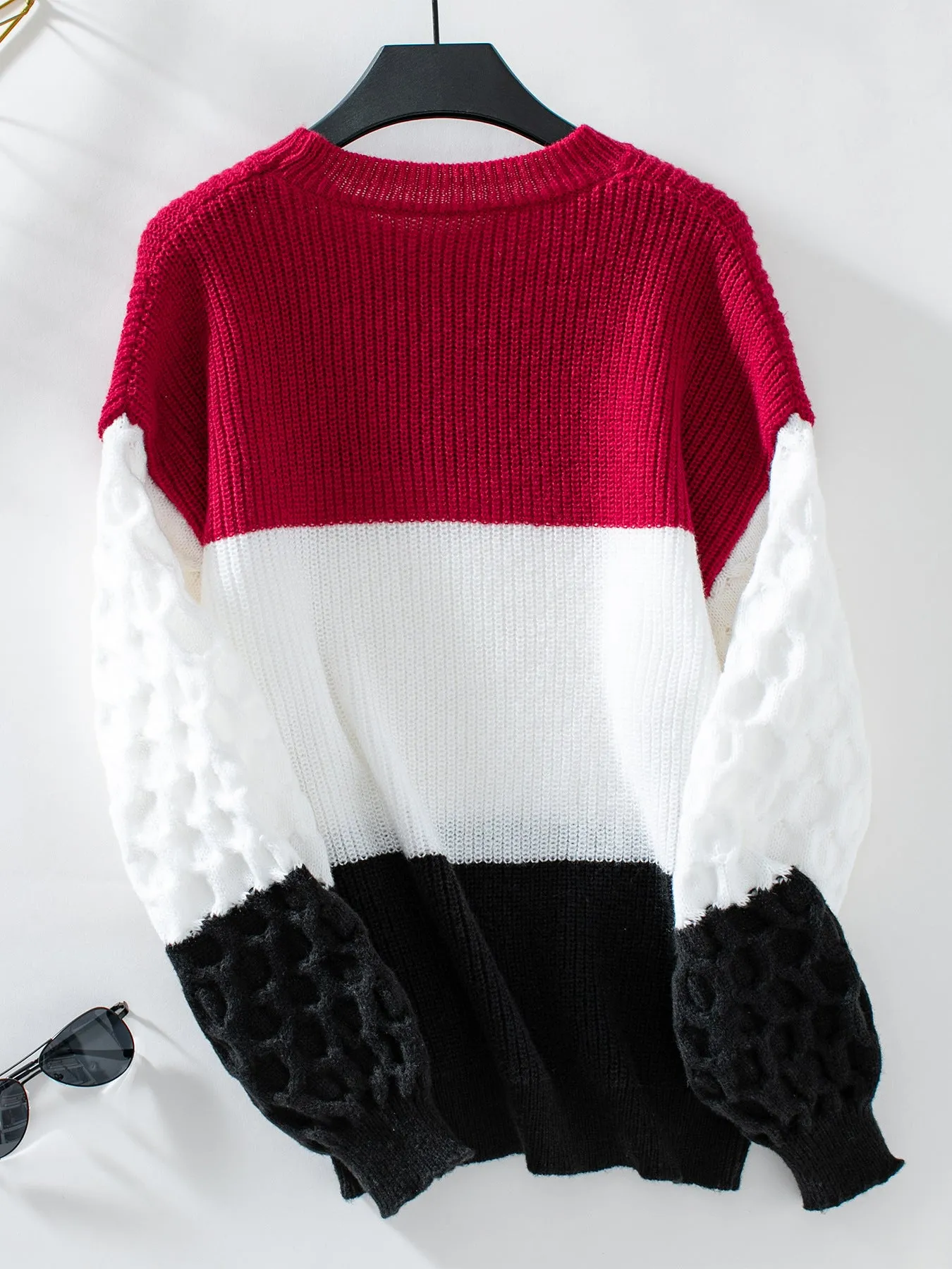 Trendy Women's Cable Knit Sweater with a Round Neck Design