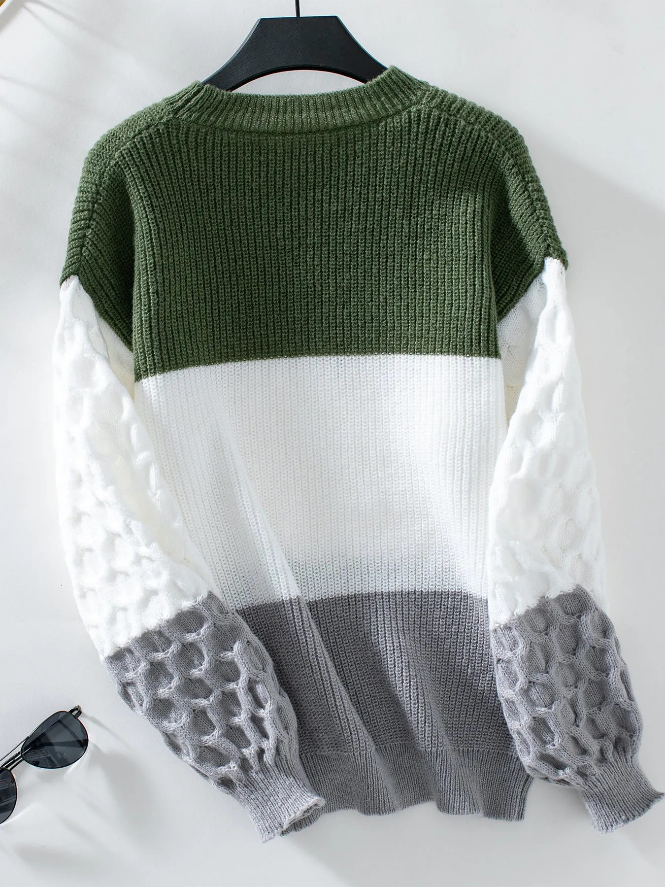 Trendy Women's Cable Knit Sweater with a Round Neck Design