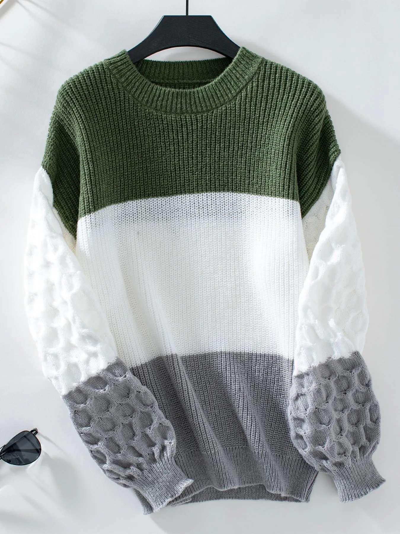 Trendy Women's Cable Knit Sweater with a Round Neck Design