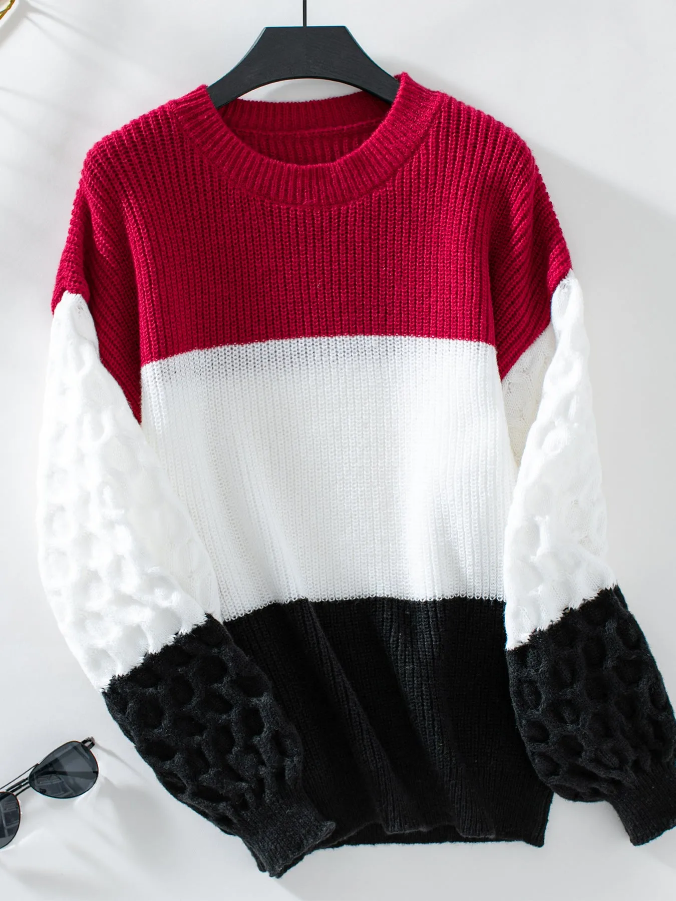 Trendy Women's Cable Knit Sweater with a Round Neck Design