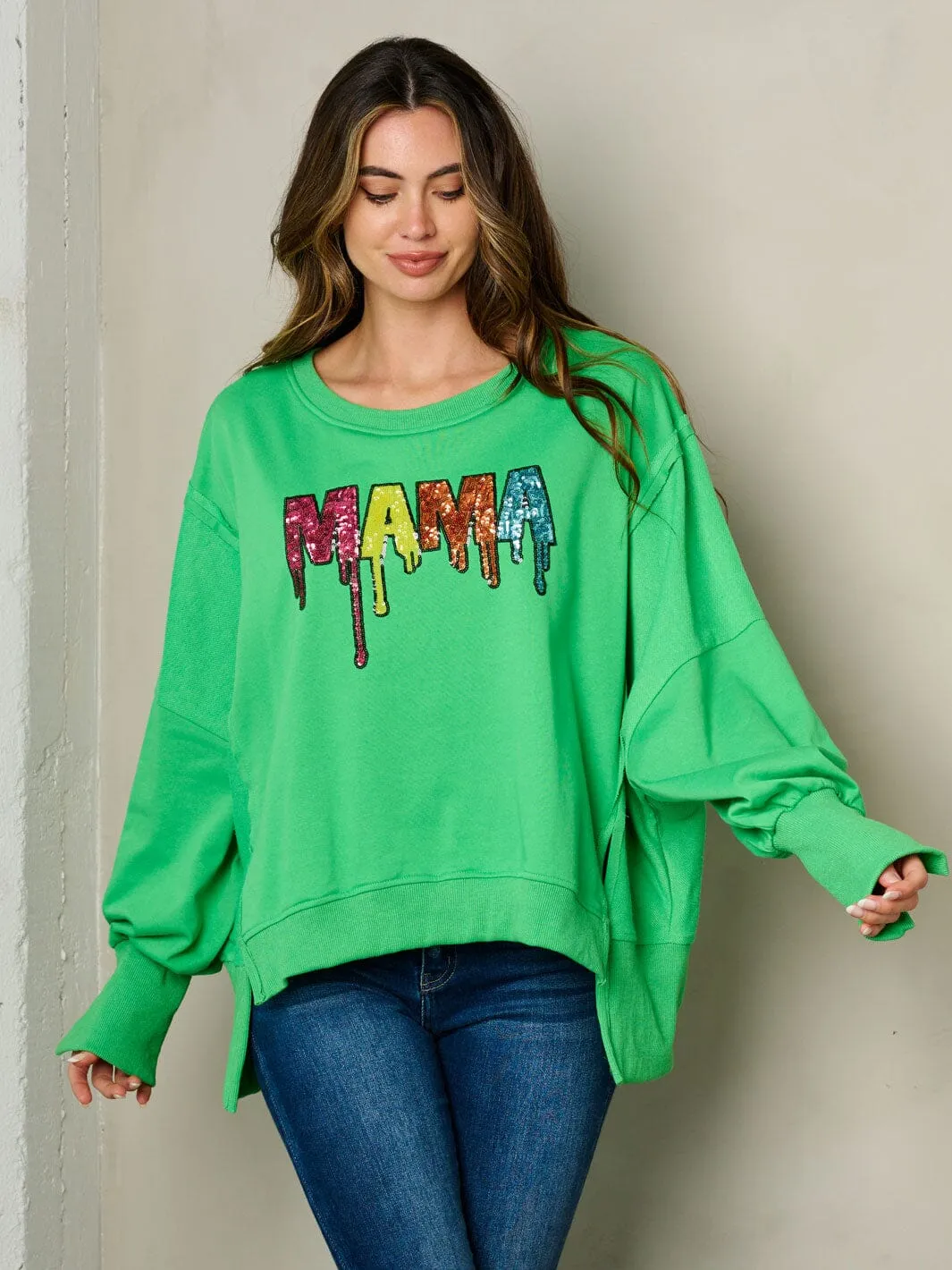 WOMEN'S LONG SLEEVE SIDE SLITS GRAPHIC SWEATER
