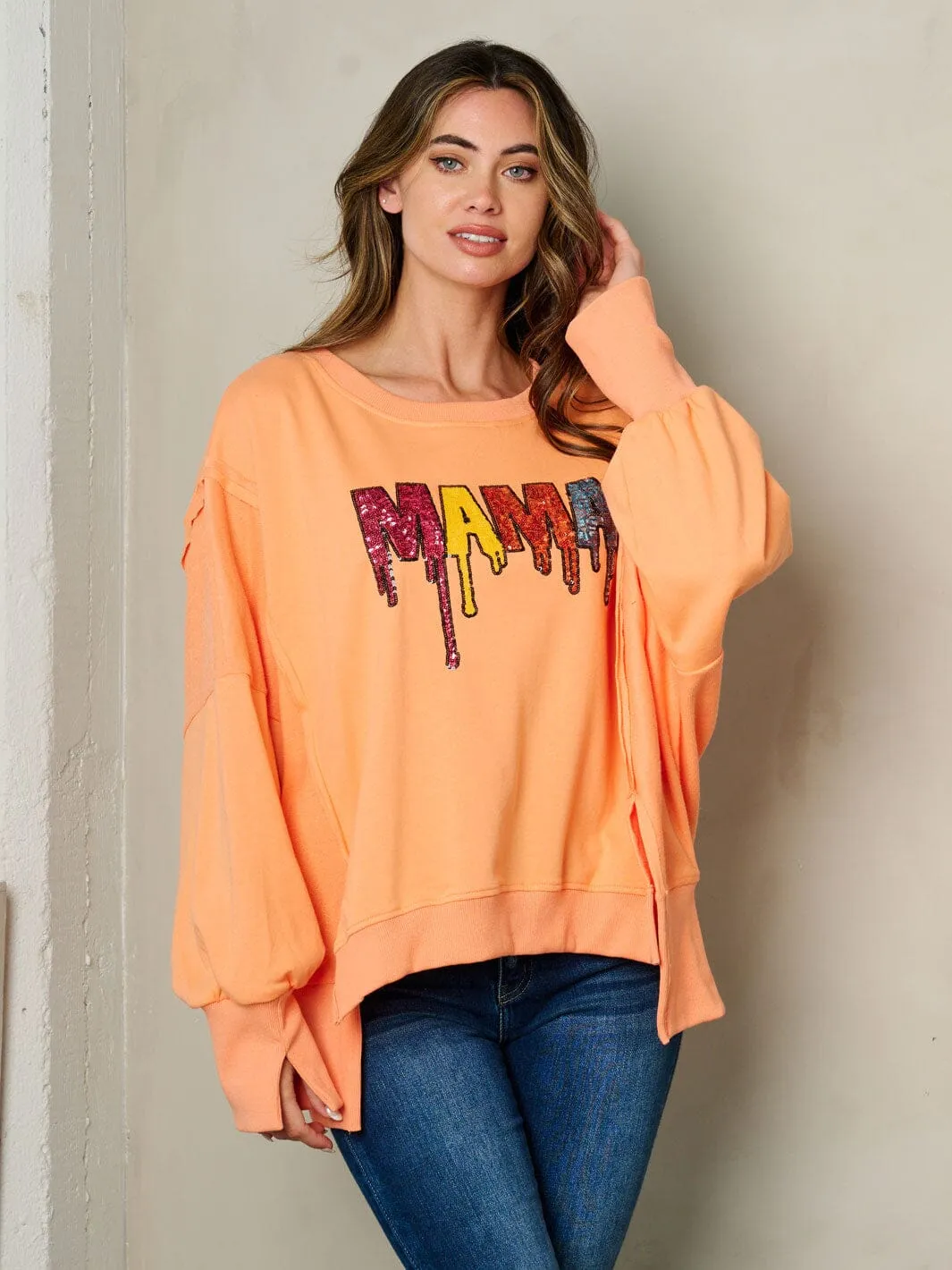 WOMEN'S LONG SLEEVE SIDE SLITS GRAPHIC SWEATER