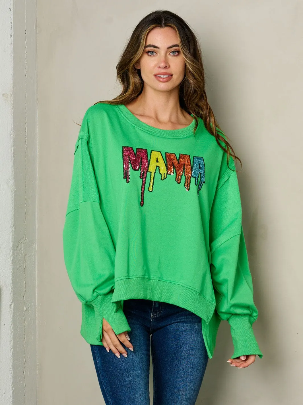 WOMEN'S LONG SLEEVE SIDE SLITS GRAPHIC SWEATER